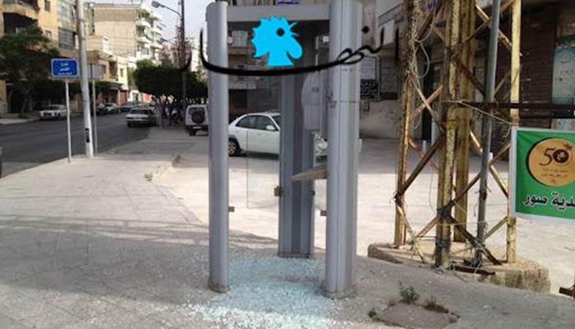 A destroyed public phone booth in Lebanon (AFP).