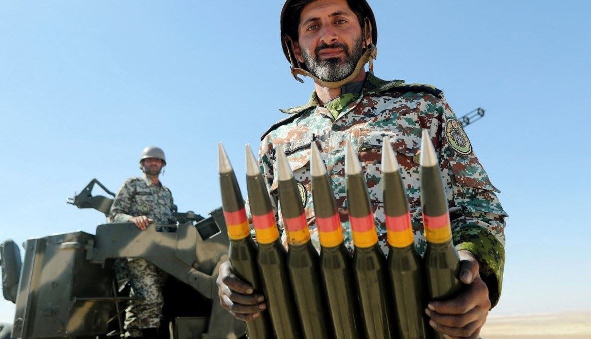جنود يشاركون في تمرين عسكري مشترك بين الجيش الإيراني وفيلق الحرس الثوري الإسلامي (13 ت1 2021، أ ف ب).