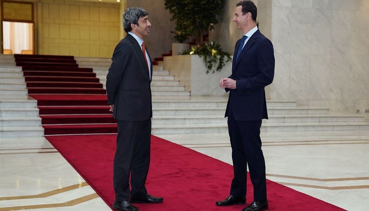 لقاء وزير الخارجية الإماراتي بالرئيس السوري بشار الأسد (أ ف ب).