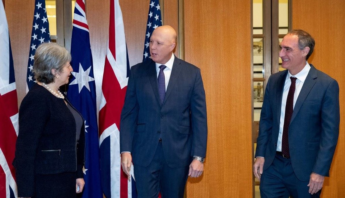 خلال توقيع الاتفاقية بين أوستراليا وبريطانيا والولايات المتحدة (أ ف ب).