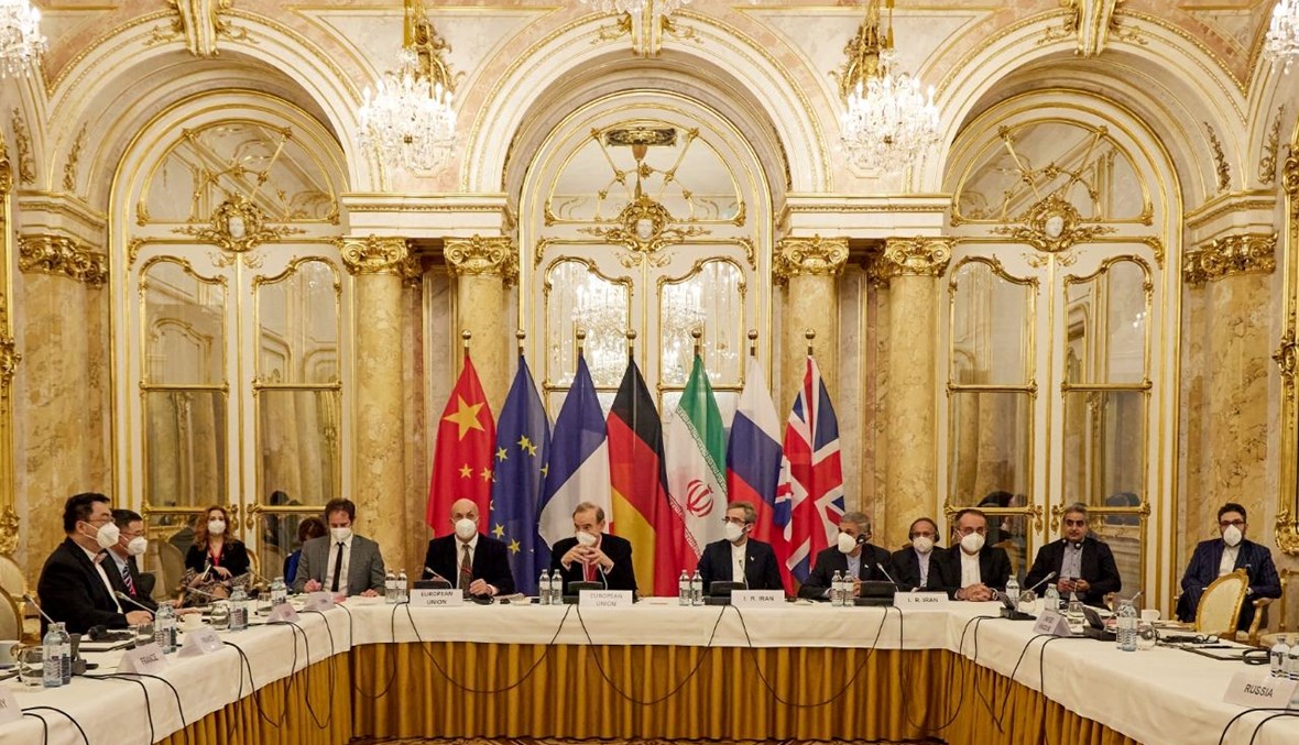 مفاوضون يشاركون في اجتماع في فيينا بالنمسا (9 ك1 2021، أ ف ب). 