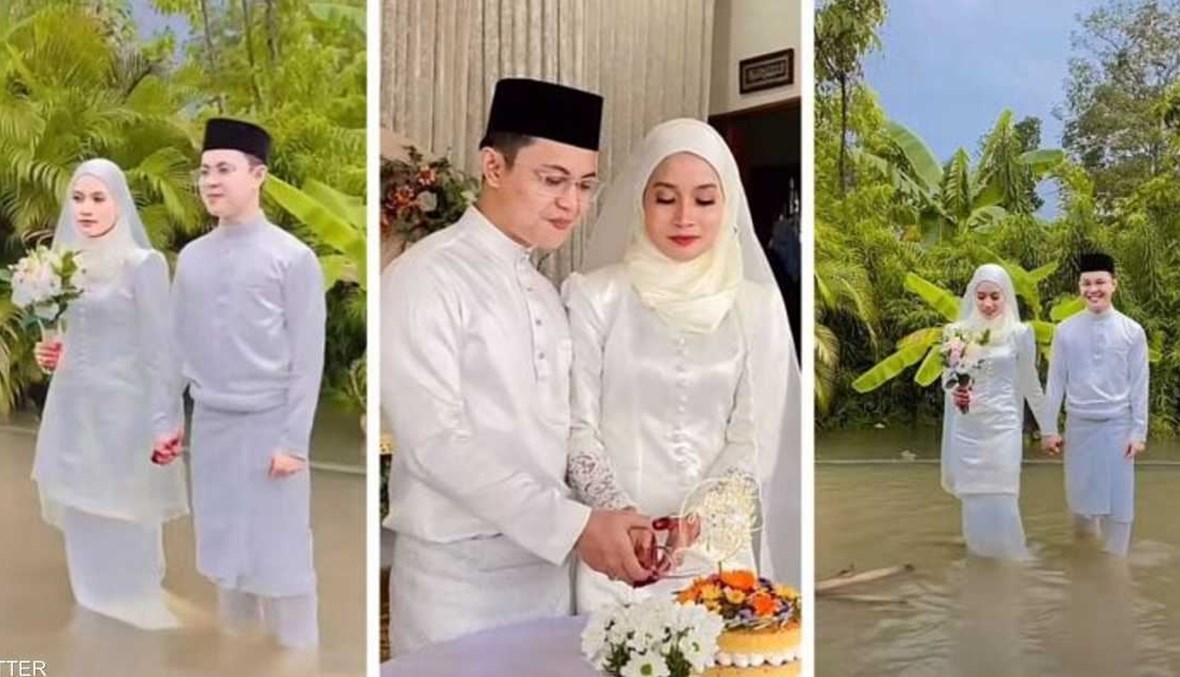 زوجان ماليزيان في حفل زفافهما.