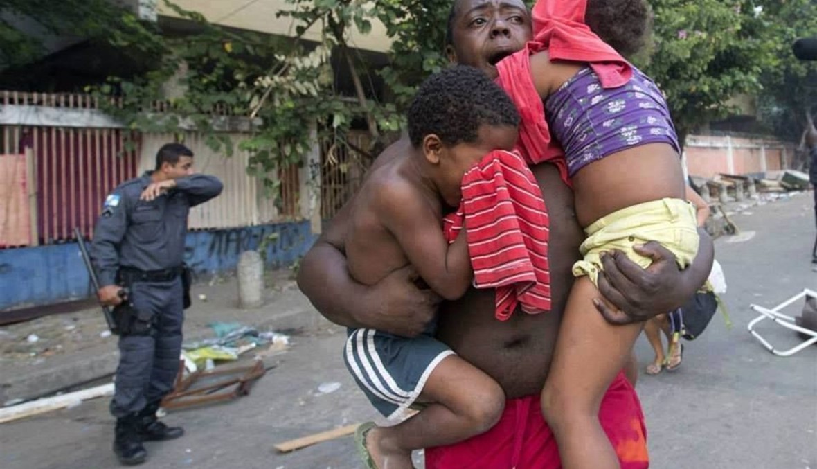 الجيش البرازيلي يحتل الأحياء الفقيرة لتأمين نهائيات كأس العالم... - بالصور